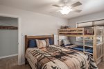 queen size bed and twin bunk beds